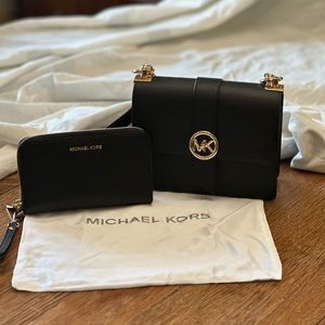 Brand new, never used small Michael Kors handbag and matching wallet!